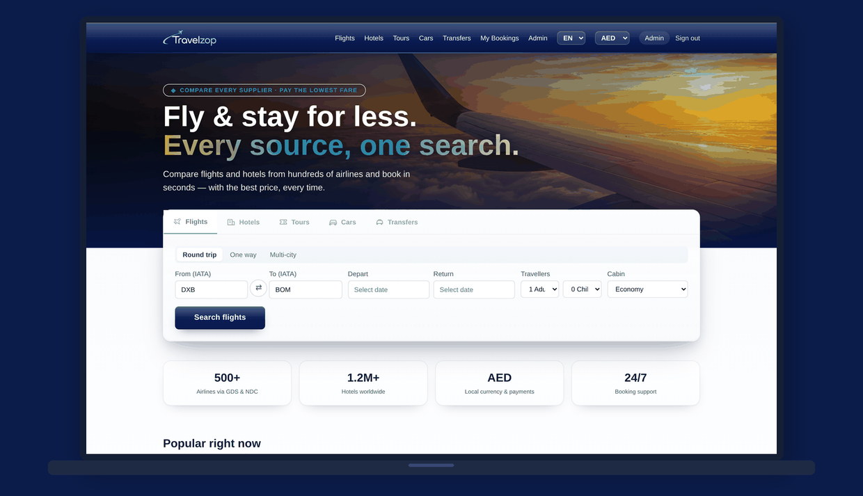 The Travelzop consumer storefront shown on a laptop